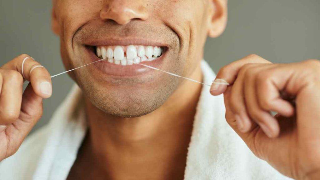 fio dental para cuidar dos dentes